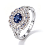 Oval Sapphire Scalloped Halo Silver Ring
