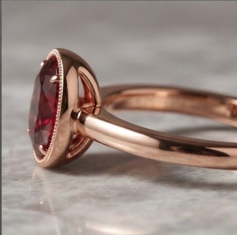 Oval Ruby Bezel Rose Gold Ring